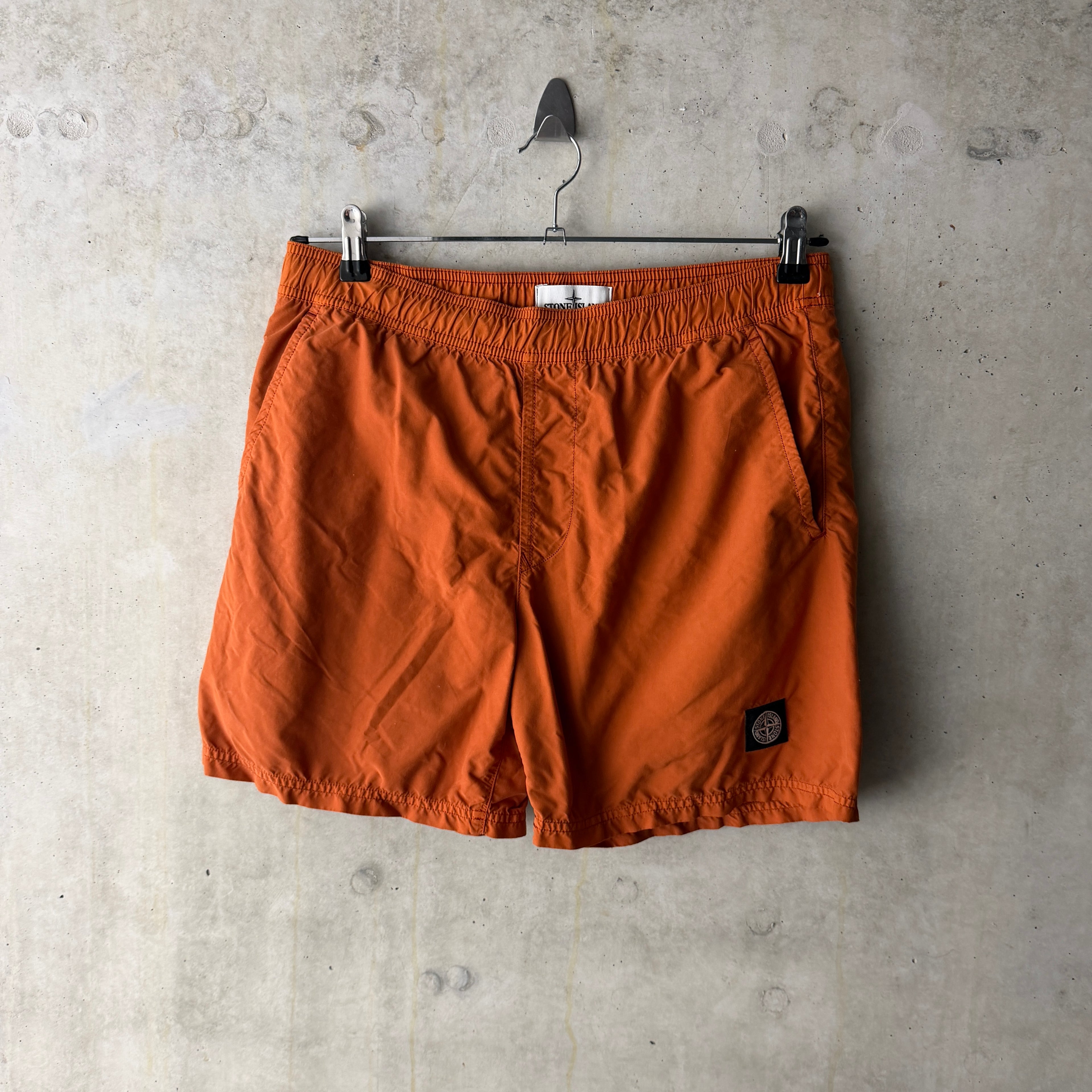 Stone Island Compass swim shorts rust orange front view
