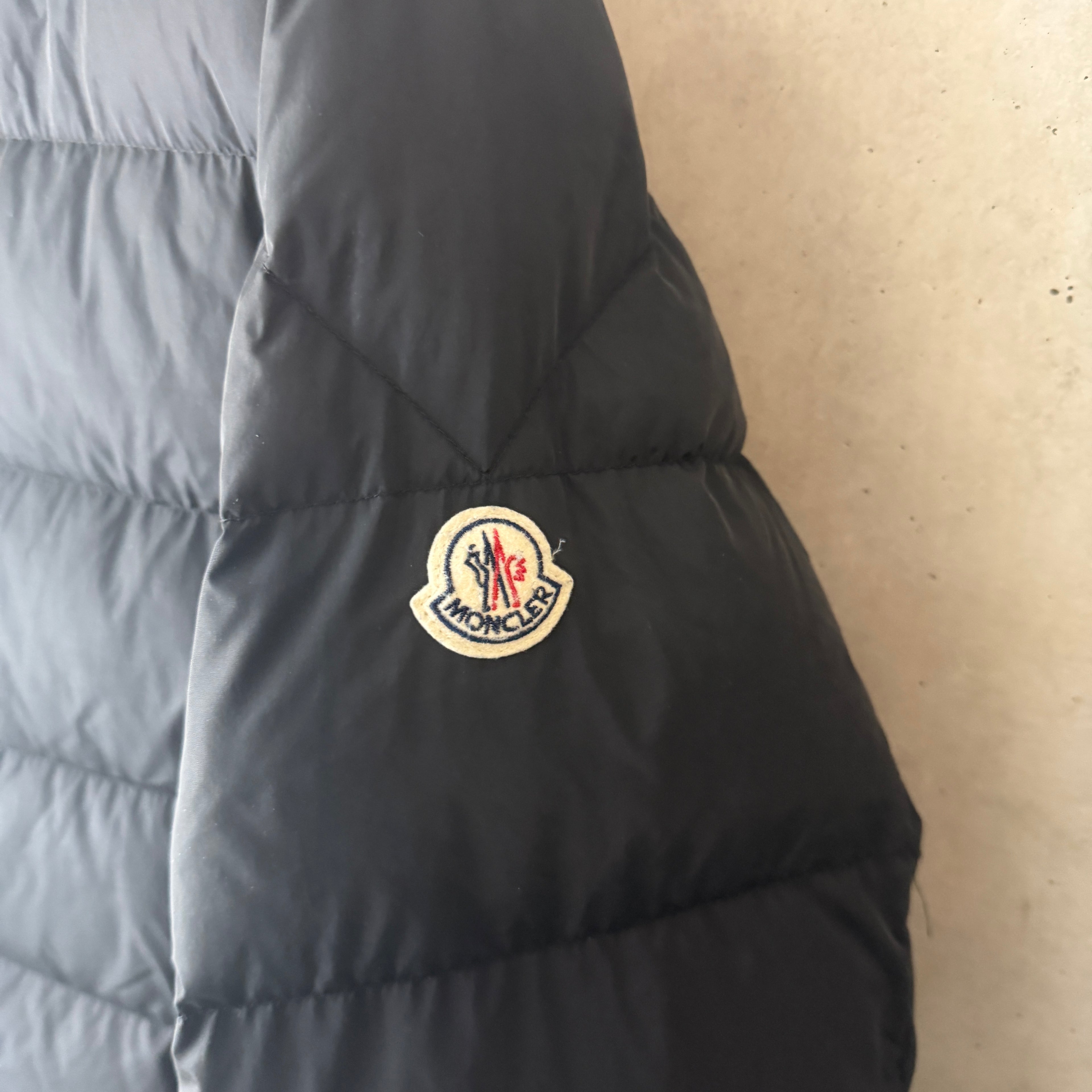 Moncler Gres Giubbotto Down Jacket — badge