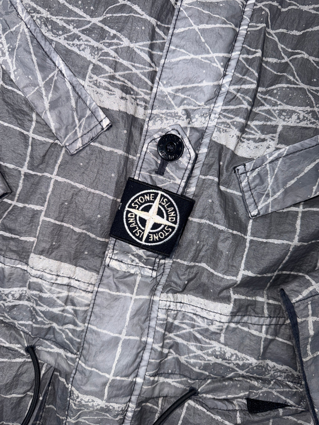 Stone Island Reflective Grid On Lamy-TC Parka — badge