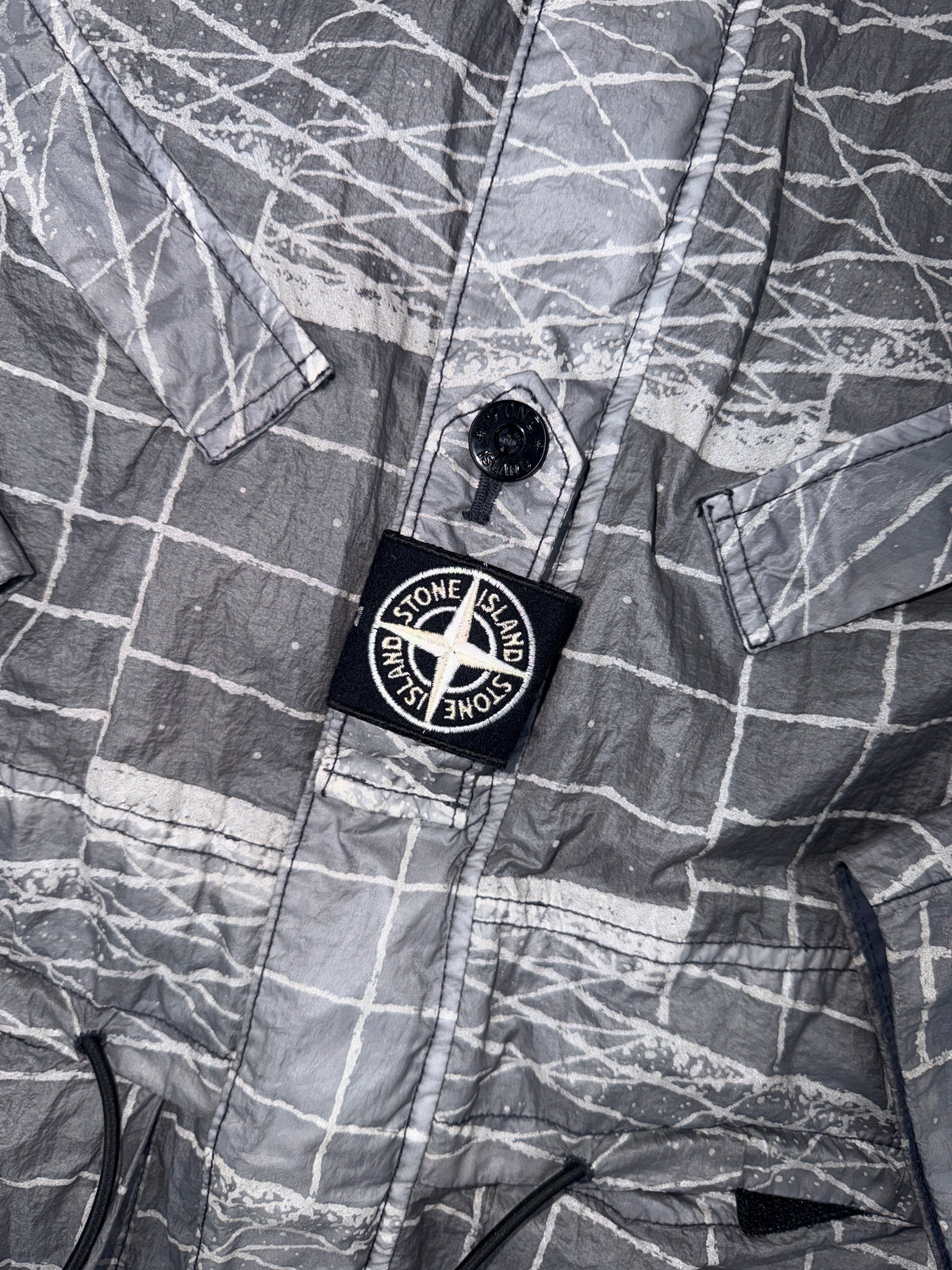 Stone Island Reflective Grid On Lamy-TC Parka — badge