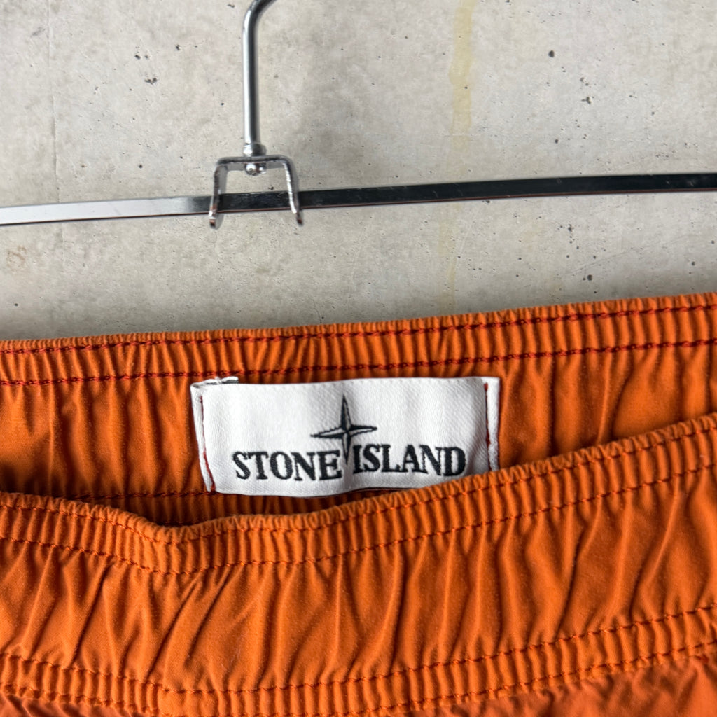 Stone Island Compass swim shorts rust orange care label