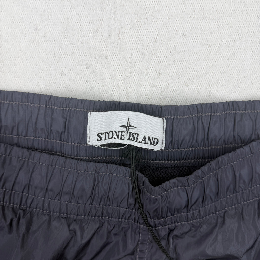 Stone Island Water Reactive Faded Camo Swim Shorts — label