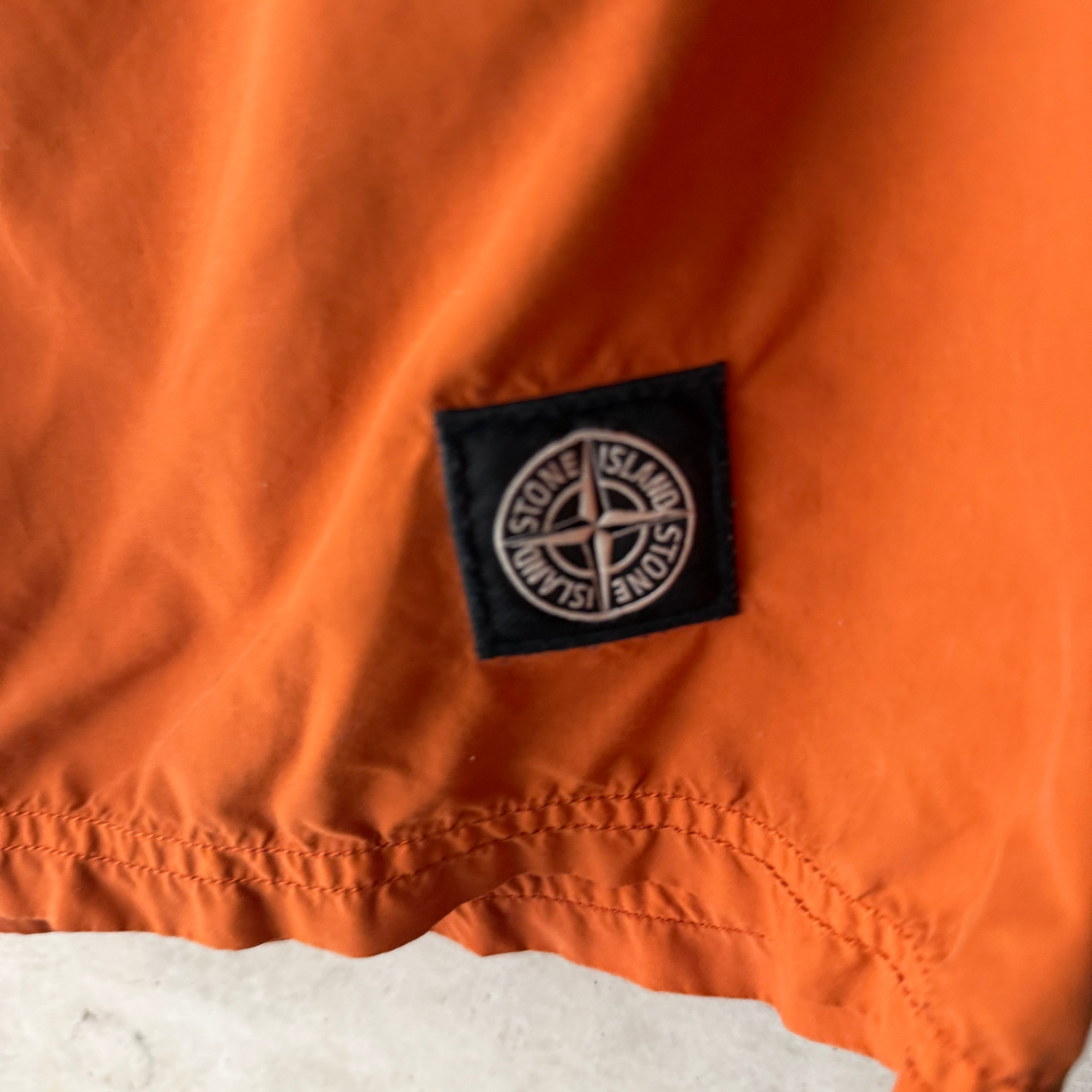 Stone Island Compass swim shorts rust orange badge detail