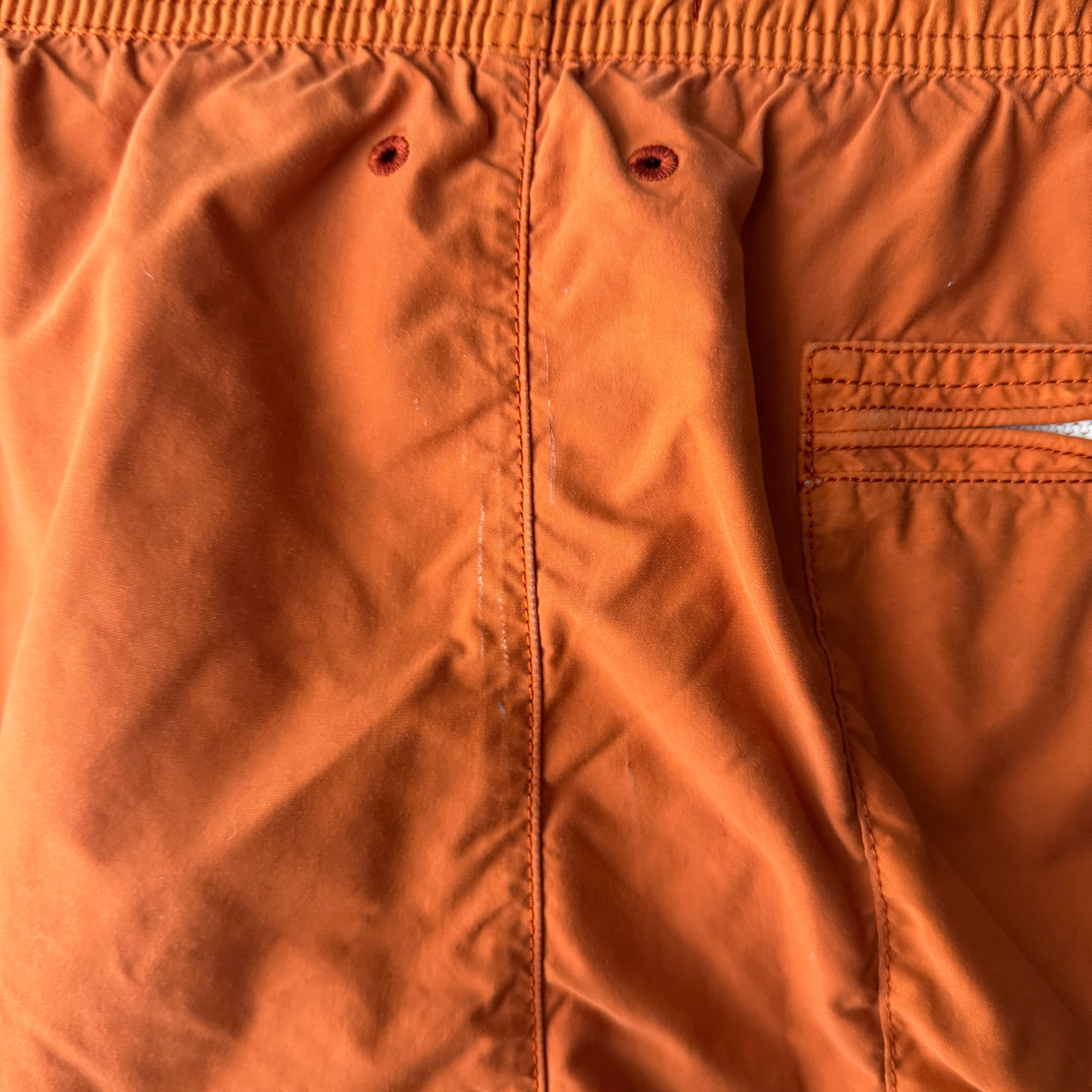 Stone Island Compass swim shorts rust orange detail view