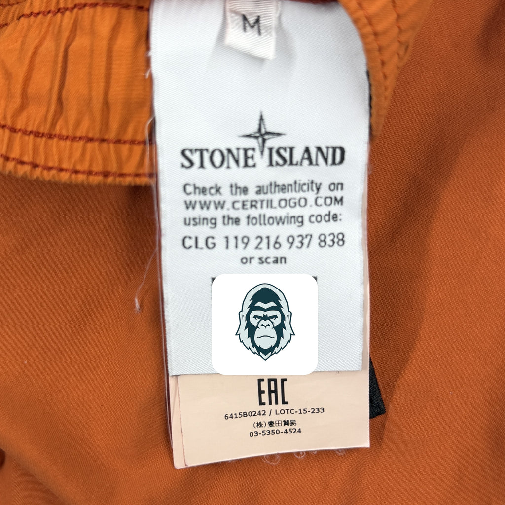 Stone Island Compass swim shorts rust orange authenticity label