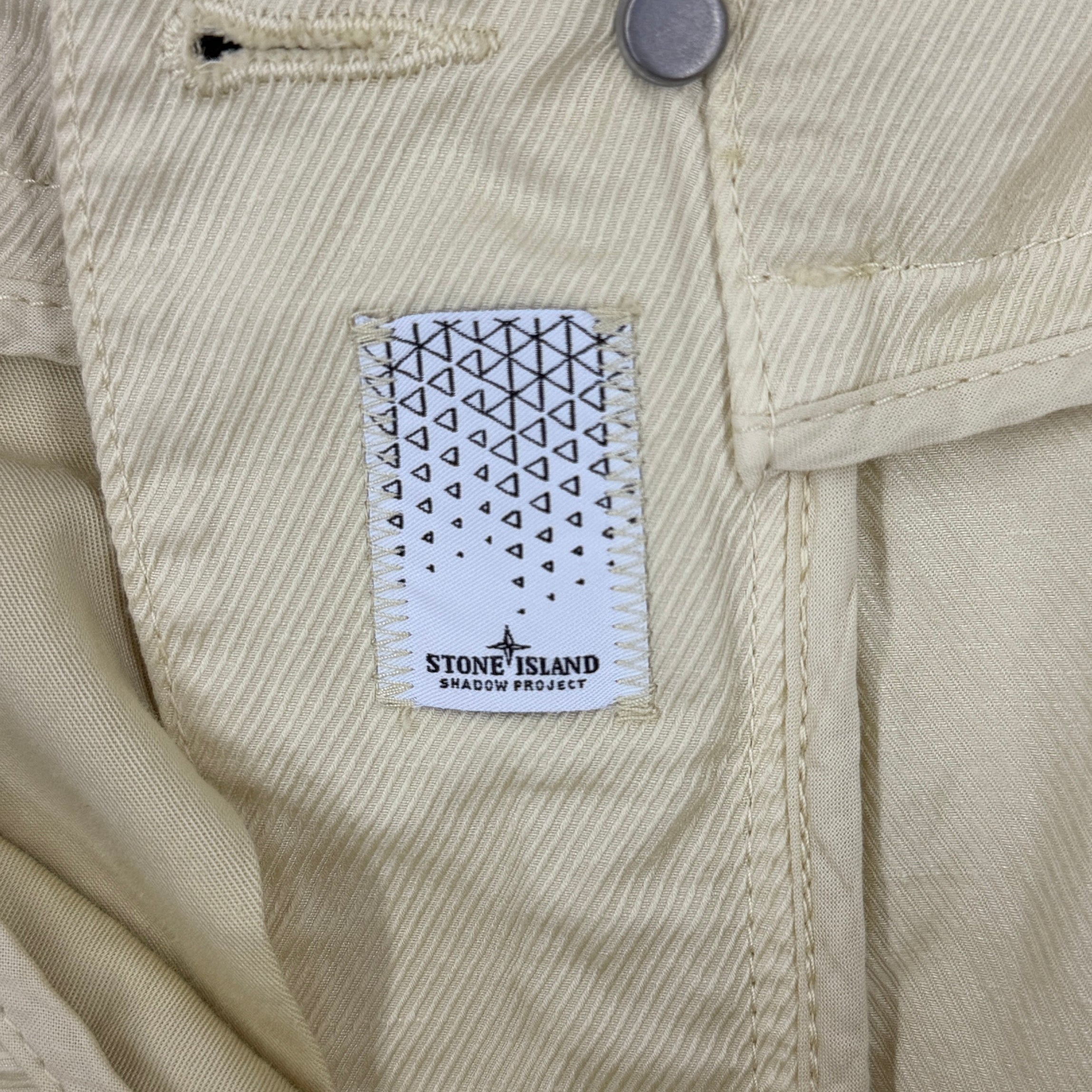 Stone Island Shadow Project cargo shorts pale yellow detail view
