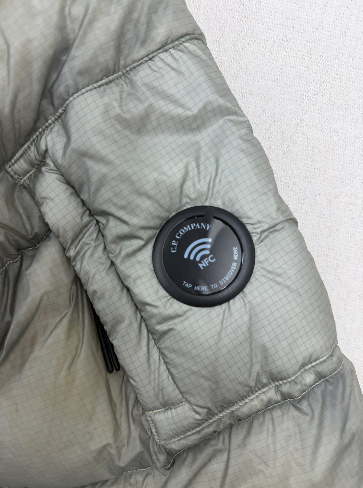 C.P. Company D.D. Shell Hooded Down Jacket — badge