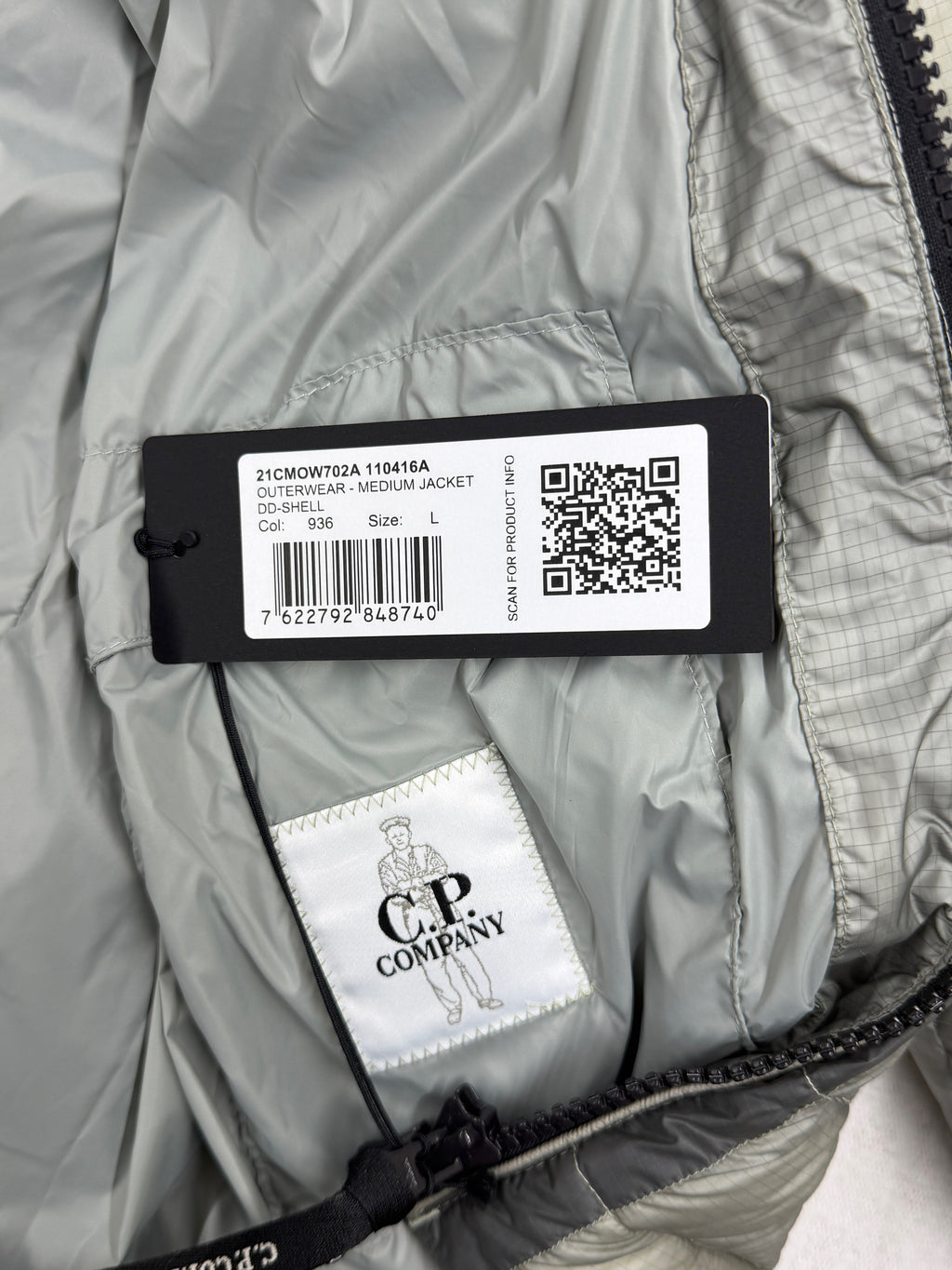 C.P. Company D.D. Shell Hooded Down Jacket — tag