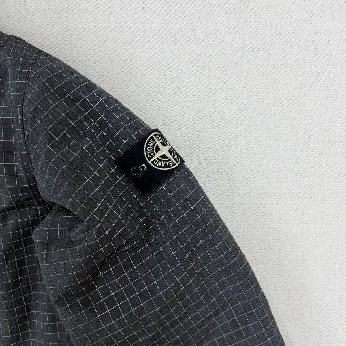 Stone Island AW20 Reflective Ripstop Chiné with PrimaLoft Insulation Jacket Smock — detail