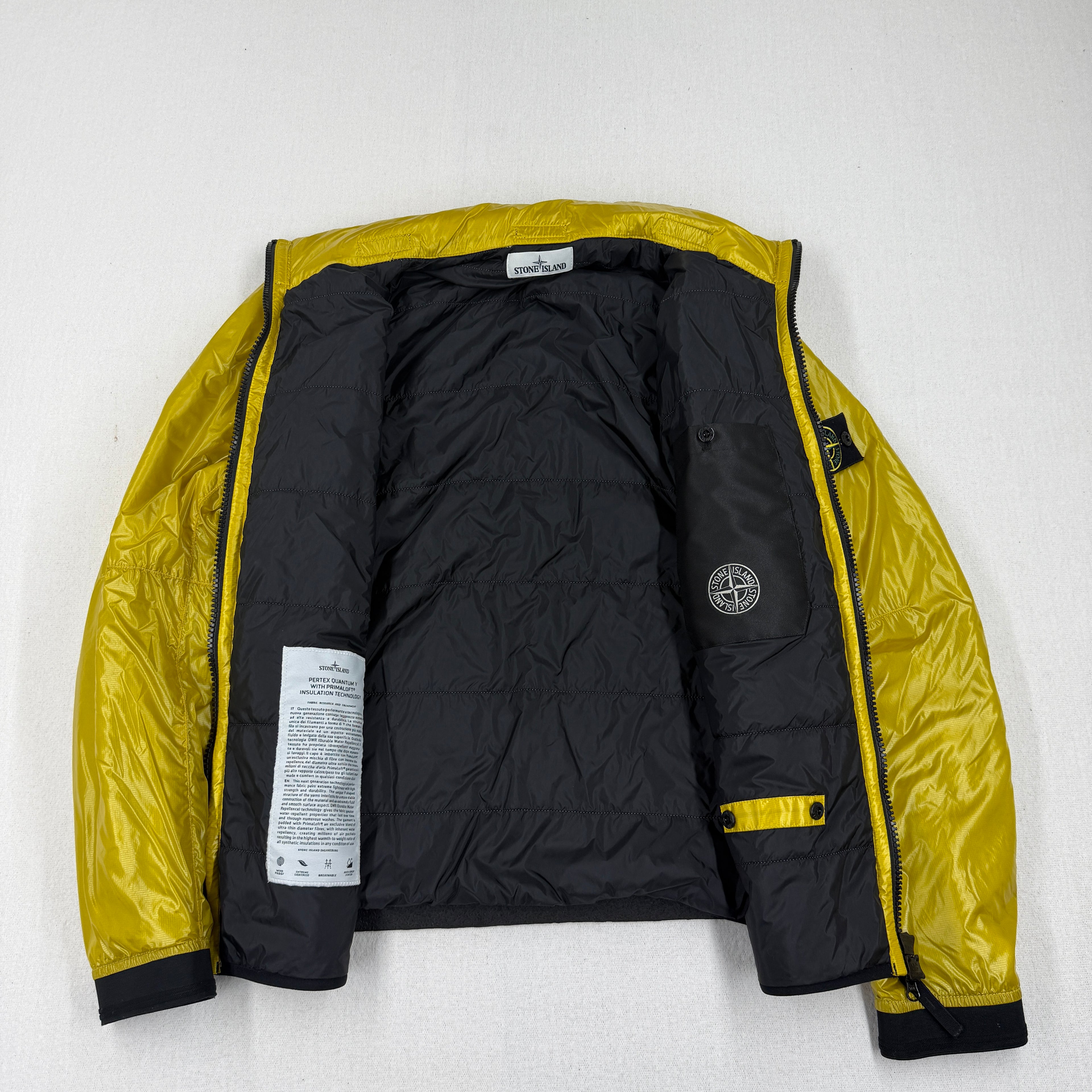 Primaloft quilted interior with Stone Island compass print