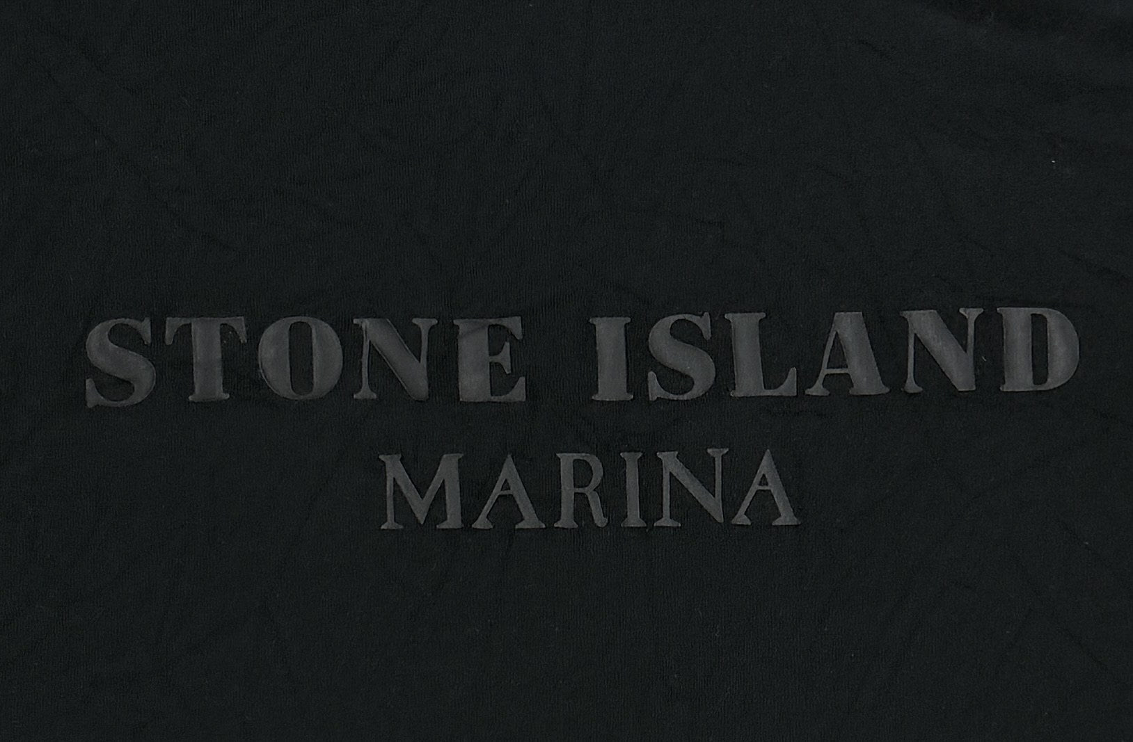 Close-up of tonal STONE ISLAND MARINA back print